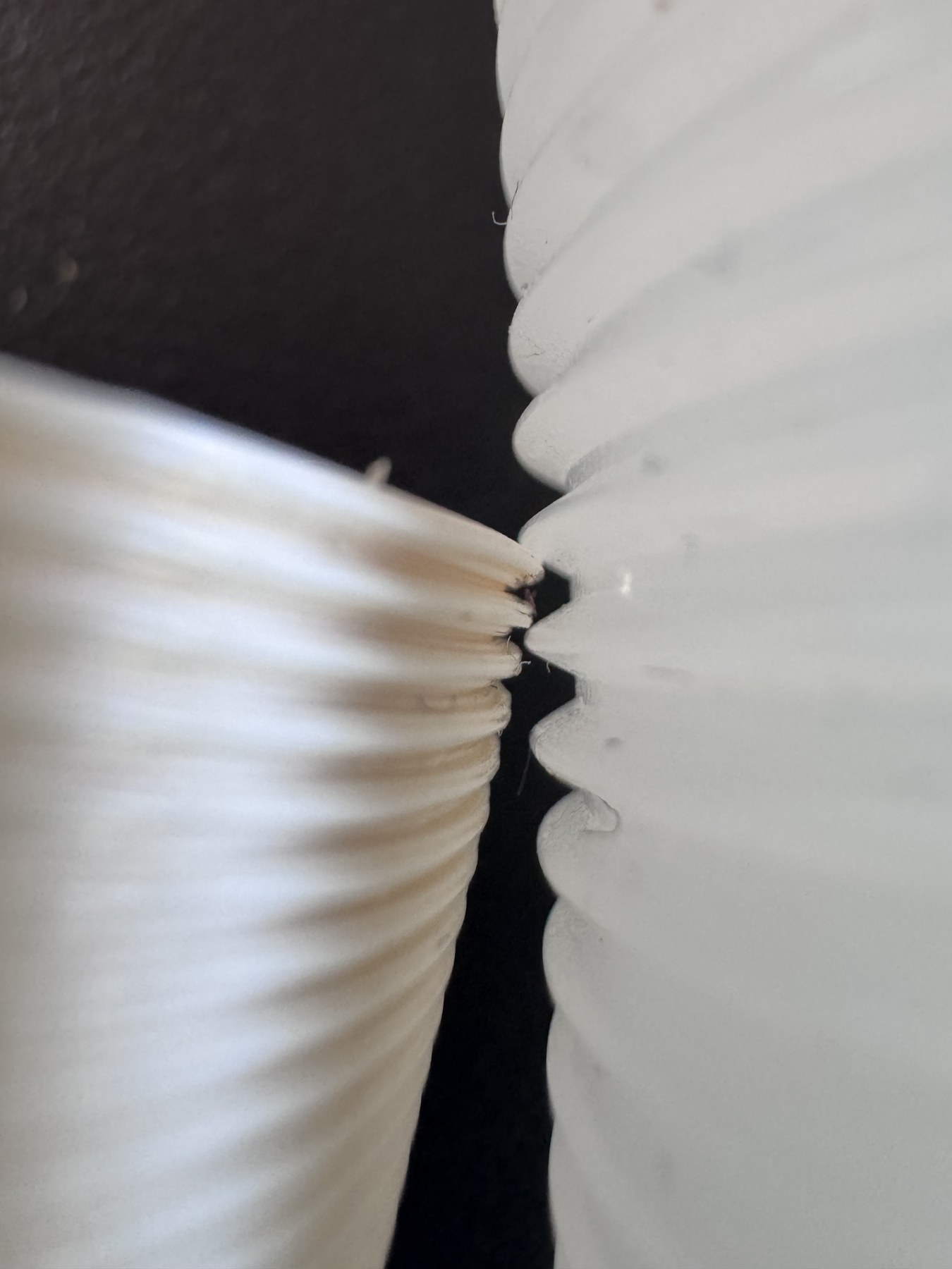 Close-up of original threads vs printed threads