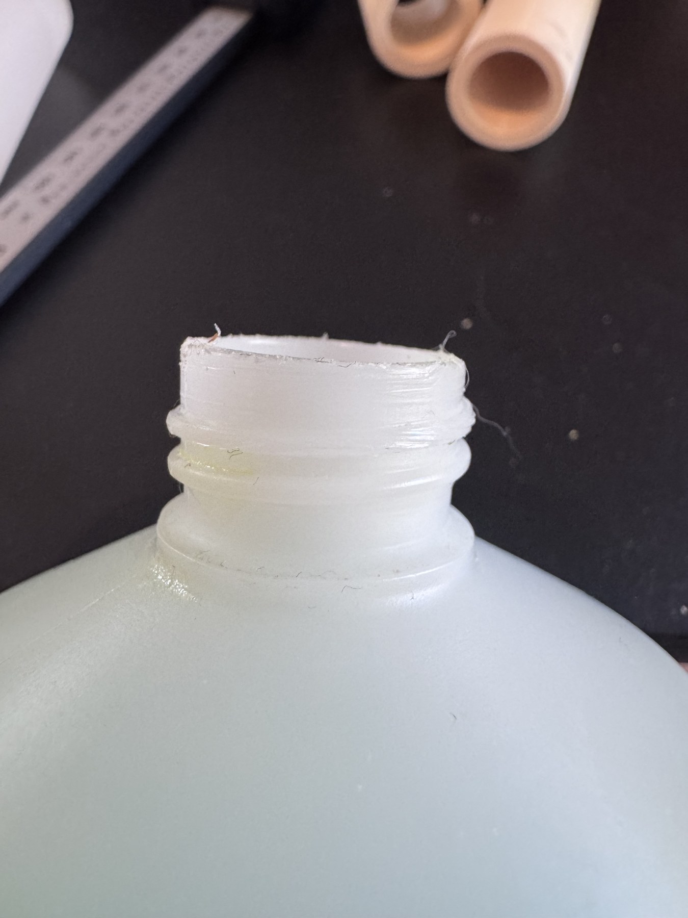 The Grohe soap bottle neck with external thread